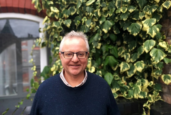 Head and shoulders shot of a smiling Professor Nigel Cunliffe